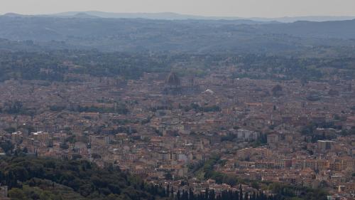 an aerial view of a city with buildings at Hotel Villa Bonelli in Fiesole