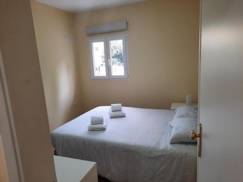 Katil atau katil-katil dalam bilik di Metro Vilar Suites & Villas
