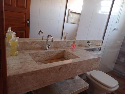 Kylpyhuone majoituspaikassa Residencia Sao Miguel