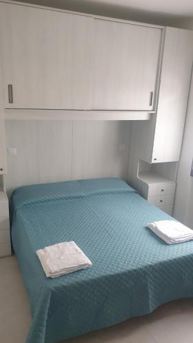 Posteľ alebo postele v izbe v ubytovaní Casa Vacanze da Mary P