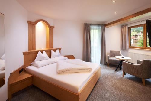 Cama o camas de una habitación en Auenhotel