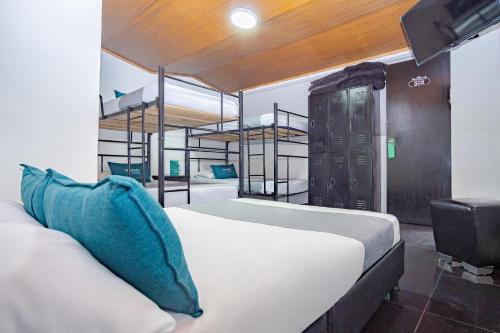 Postelja oz. postelje v sobi nastanitve Hotel Bogota Home