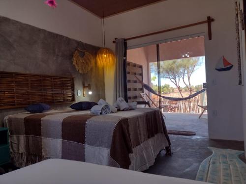 Ένα ή περισσότερα κρεβάτια σε δωμάτιο στο FLATS MACAPÁ MEU AMOR 6
