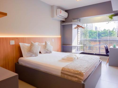 A bed or beds in a room at Haus Stay Luxo Vila Mariana