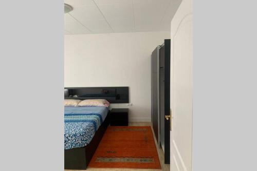 a bedroom with a bed in a room at Para un descanso total in Sant Jaume dels Domenys