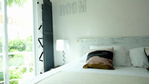 Una cama o camas en una habitación de Book House Marina Diamante