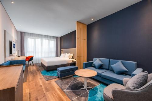 Postel nebo postele na pokoji v ubytování Holiday Inn Express Dongyang Hengdian by IHG