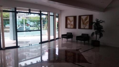 Χώρος καθιστικού στο Apartamento condomínio Ilha Bela - Braga