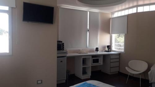 Μια τηλεόραση ή/και κέντρο ψυχαγωγίας στο complejo lucila suites