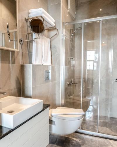 Ванная комната в Side Kleopatra Hotel