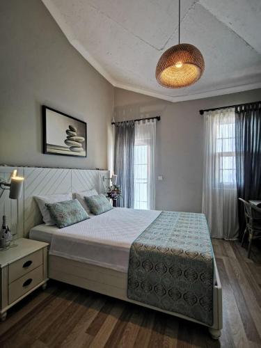Кровать или кровати в номере Side Kleopatra Hotel