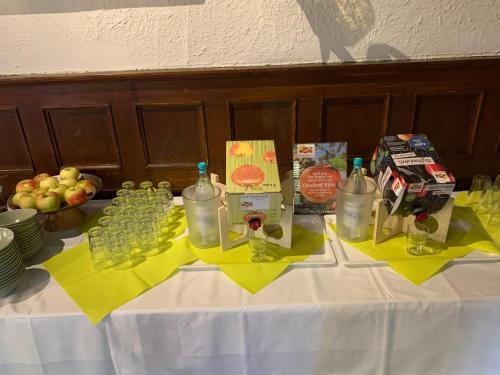a table with bottles of water and other food on it at Hotel Goldene Krone in Goslar