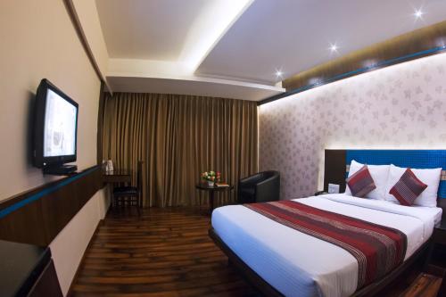 Giường trong phòng chung tại President Hotel