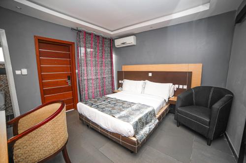 Postel nebo postele na pokoji v ubytování Fini Hotel Bobende