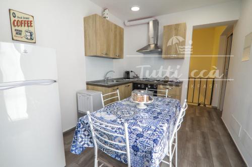 Kuchyň nebo kuchyňský kout v ubytování Tutti ccà Airport Rooms
