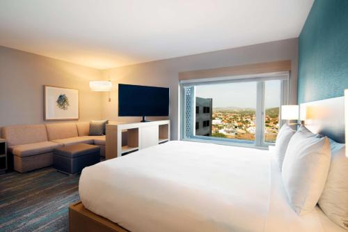Postel nebo postele na pokoji v ubytování Hyatt Place Aruba Airport