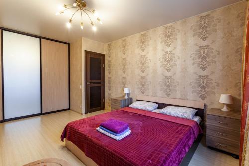  Кровать или кровати в номере Busines Brusnika Apartment Tsaritsyno 