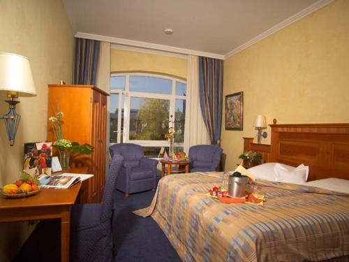 Postel nebo postele na pokoji v ubytování Hotel Alte Straßenmeisterei