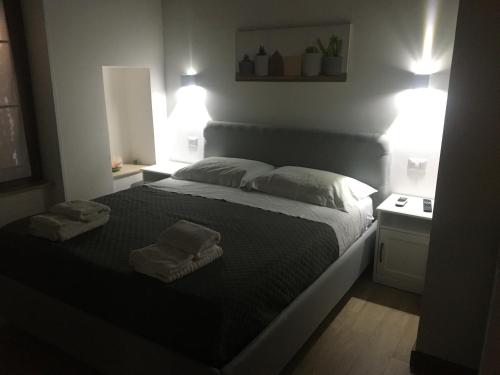 Кровать или кровати в номере Largo Otranto - Guest House