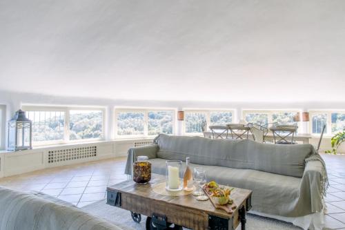 Posezení v ubytování L'Hostellerie du Moulin des Oliviers
