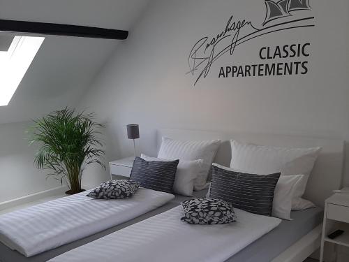 Postel nebo postele na pokoji v ubytování Bugenhagen - Classic Appartements