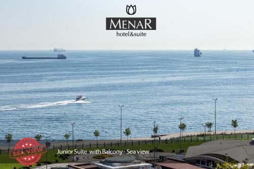 a view of the ocean with two ships in the water at MENAR HOTEL&SUITES -Old City Sultanahmet in Istanbul