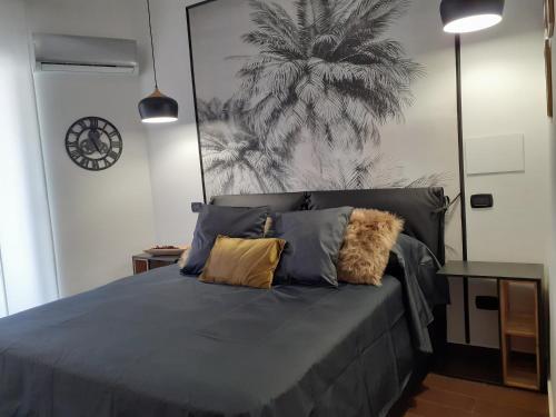 Ένα ή περισσότερα κρεβάτια σε δωμάτιο στο Borgo Fontana B&B