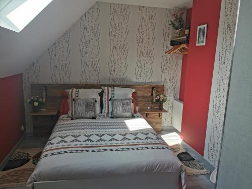 Ein Bett oder Betten in einem Zimmer der Unterkunft Bienvenue chez moi à Concevreux