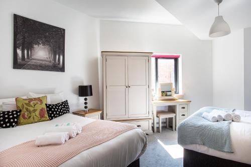 Postel nebo postele na pokoji v ubytování Modern Luxury Apartment, Sleeps 6, Best Location