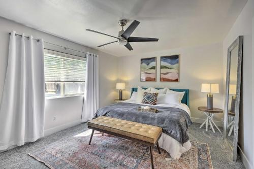 a bedroom with a bed and a ceiling fan at Stylish Bakersfield Getaway with Pool Table! in Bakersfield