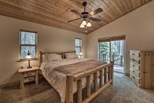 a bedroom with a bed and a ceiling fan at Soda Springs Cabin Near Donner Lake and Ski Resorts! in Soda Springs