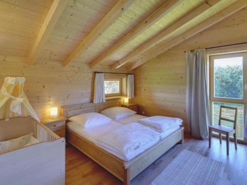 Ένα ή περισσότερα κρεβάτια σε δωμάτιο στο Ferienhaus Eller