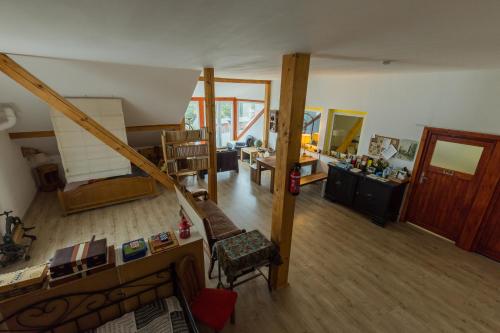 a large living room with a staircase and a living room at Traumhafte Ferienwohnung in Ratzeburg