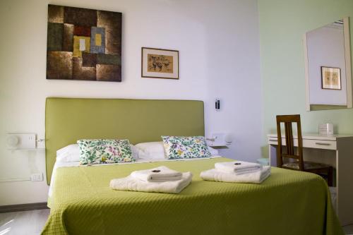 Postel nebo postele na pokoji v ubytování Torre Del Pozzo