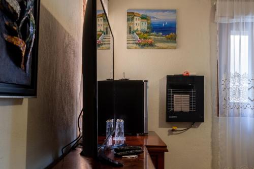 a room with a desk with a computer on it at Casa Maricela B&B in San Miguel de Allende