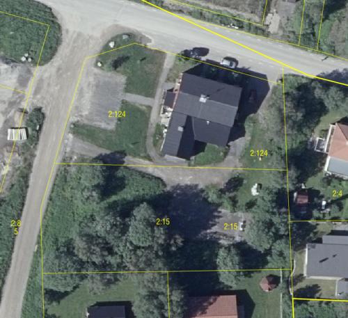 an aerial view of a yard with buildings on a road at Pearl of Duved in Duved