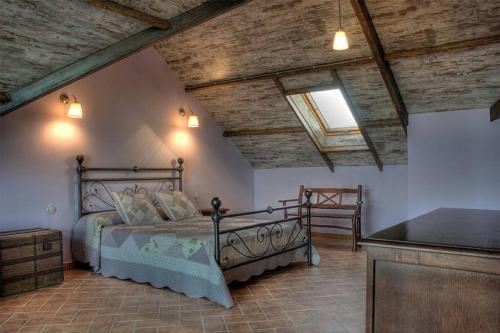 Ένα ή περισσότερα κρεβάτια σε δωμάτιο στο Casa CijaraRural
