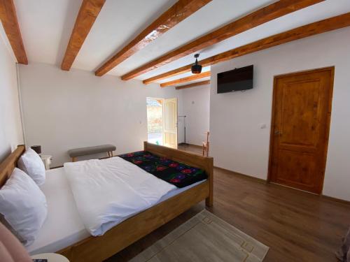 Voodi või voodid majutusasutuse Casa de Vacanta FAMILY & FRIENDS toas