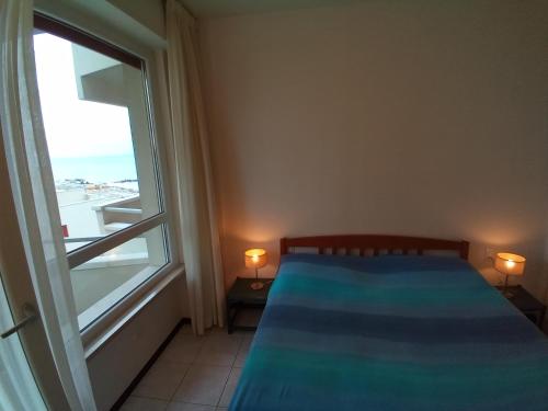 Postel nebo postele na pokoji v ubytování casa portoverde