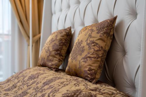 Кровать или кровати в номере Harmony Suites - Monte Carlo