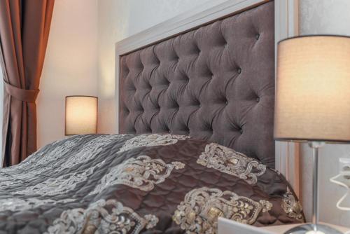 Кровать или кровати в номере Harmony Suites - Monte Carlo