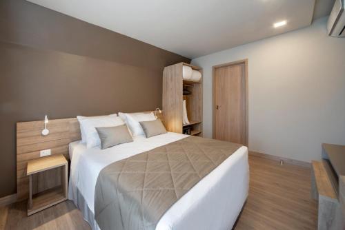 Krevet ili kreveti u jedinici u okviru objekta Laghetto Golden Resort Gramado 439
