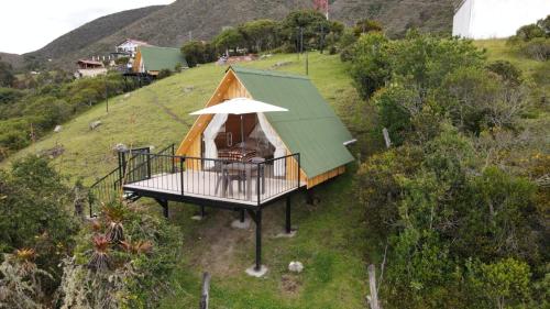 an overhead view of a yurt on a hill at ReLuna Guatavita Glamping & Suites in Guatavita