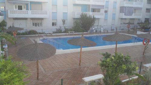 Bazén v ubytovaní Urbanización las Sirenas, 2 dormitorios alebo v jeho blízkosti
