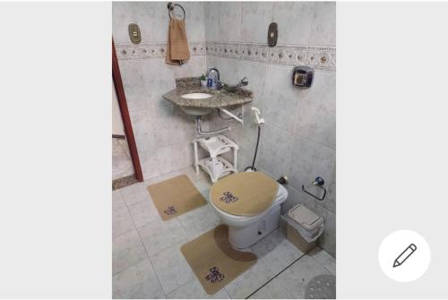Ein Badezimmer in der Unterkunft Bela Casa no Morro Chic - Itajubá - MG - Brasil