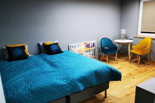 Posteľ alebo postele v izbe v ubytovaní Apartament dwuosobowy