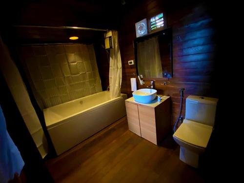 
A bathroom at Regenta Resort Soma Vine Village Nashik
