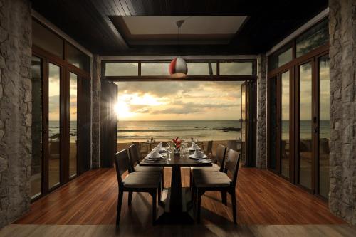 Restoran või mõni muu söögikoht majutusasutuses Natai Beach Resort and Spa - SHA Plus