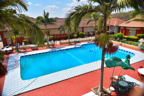 an overhead view of a swimming pool at a hotel at Chamba Valley Exotic Hotel in Lusaka