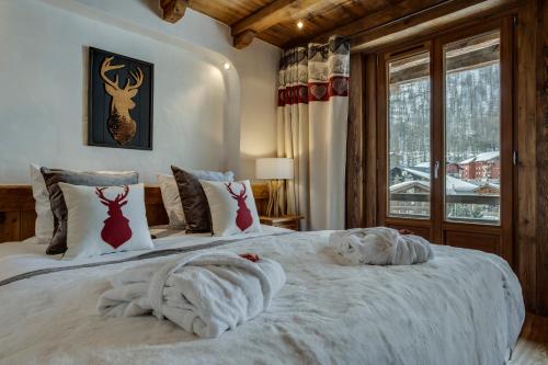 Ένα ή περισσότερα κρεβάτια σε δωμάτιο στο Chalet La Bouclia